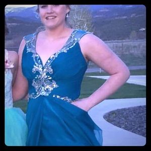 Teal sheer/satin prom dress with embellishments.